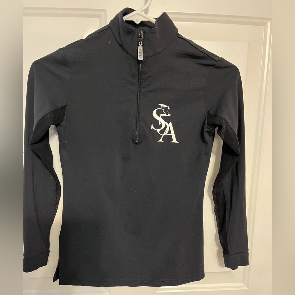 Sunshirt with mesh under sleeves to provide extra cooling.